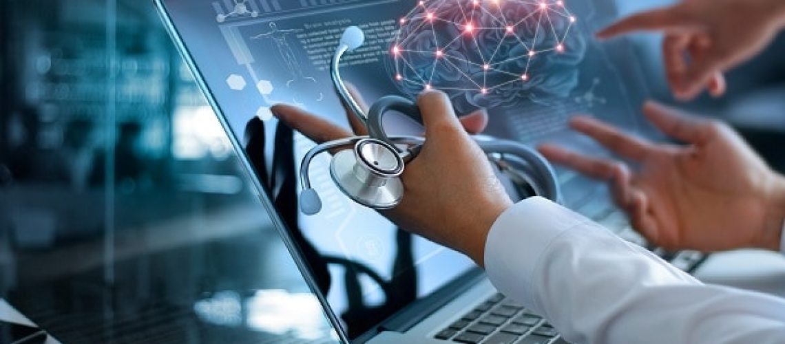 Medicine doctor team meeting and analysis. Diagnose checking brain testing result with modern virtual screen interface on laptop with stethoscope in hand, Medical technology network connection concept.